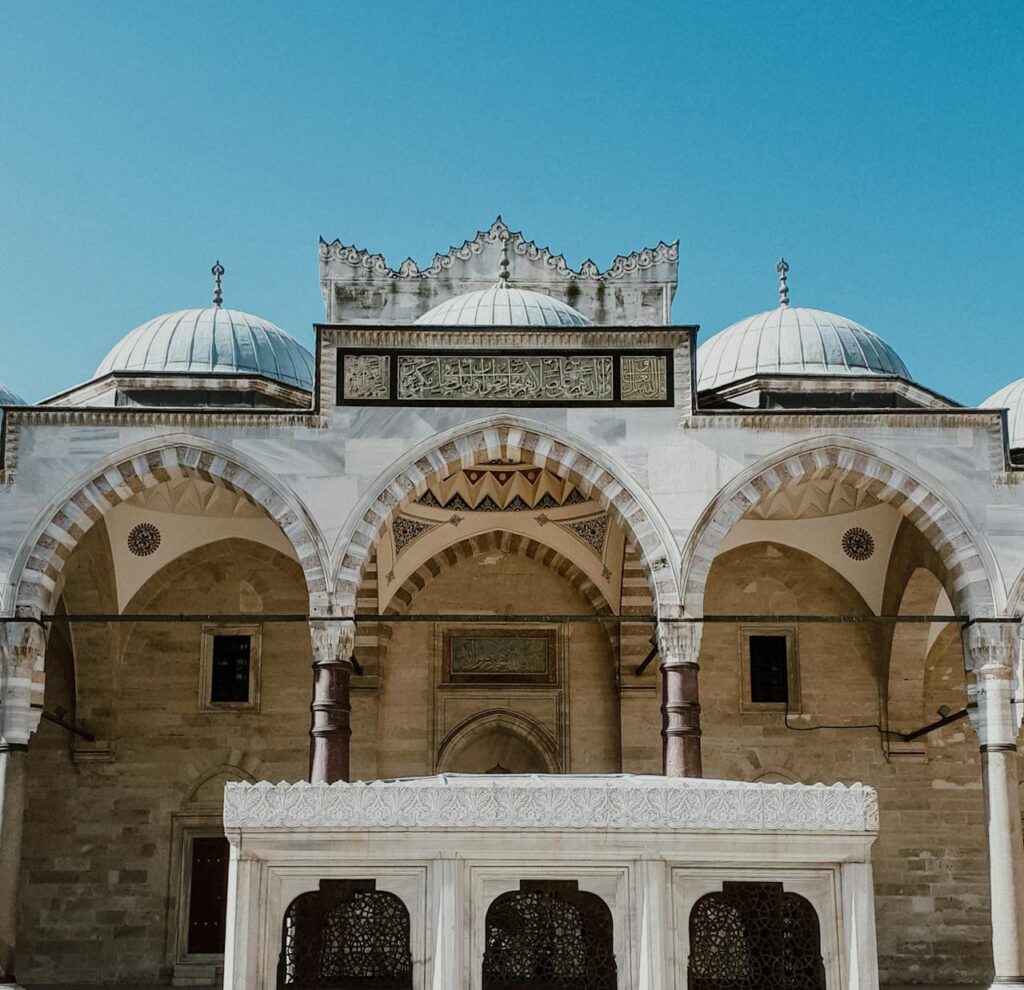 Brown and White Mosque Under Blue Sky